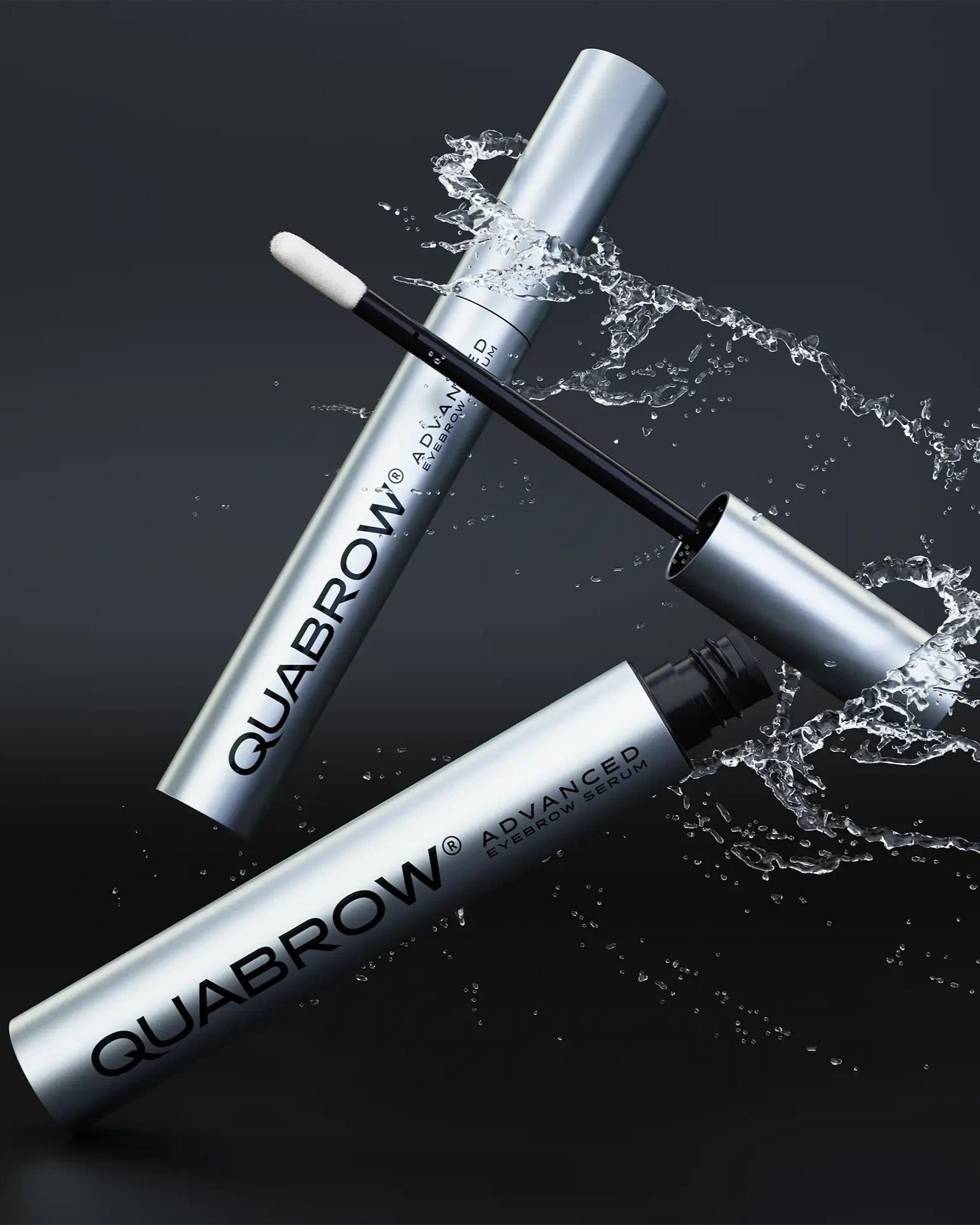 QUABROW Eyebrow Serum DUO SET shown with dynamic water splash effect on a black background