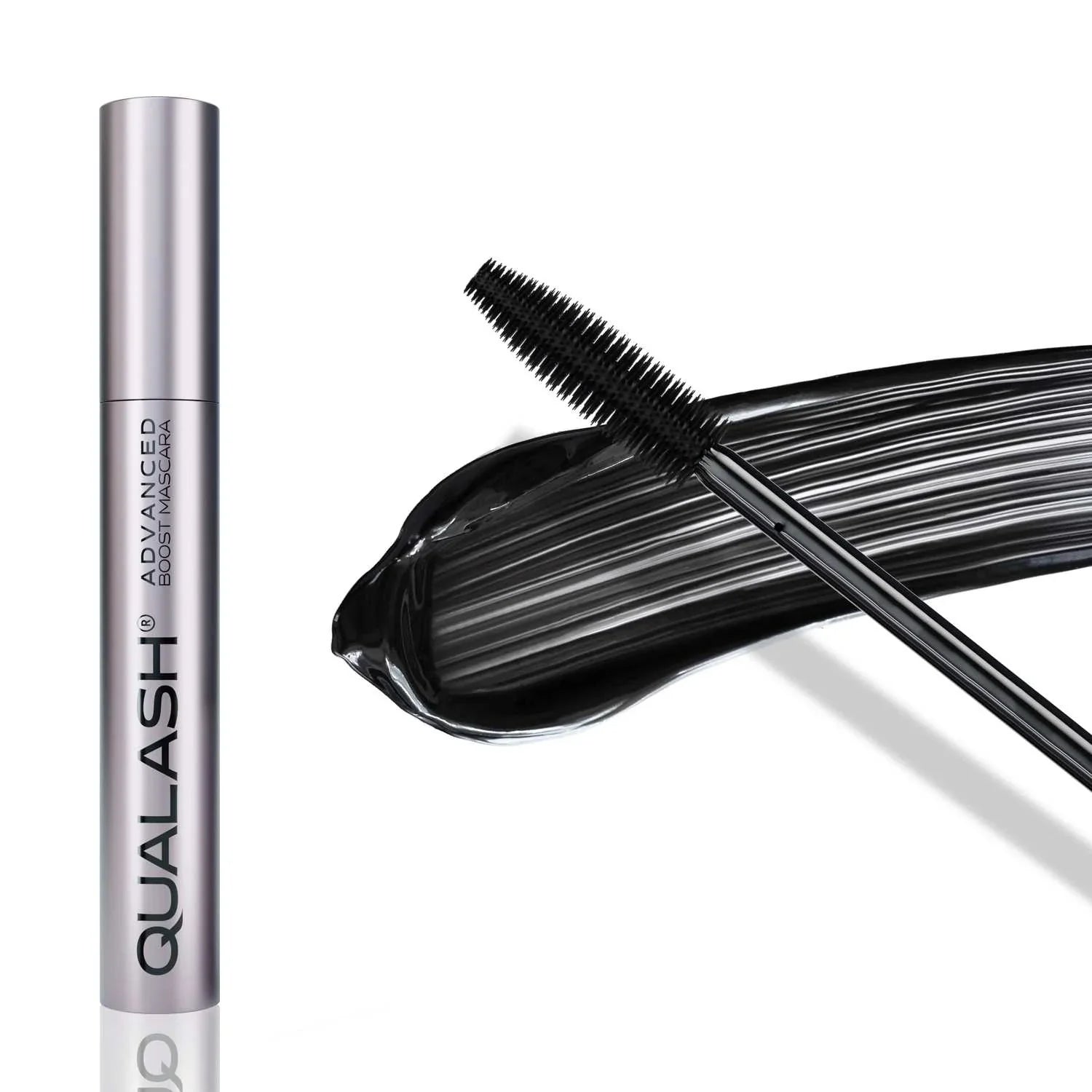 QUALASH mascara brush in close-up with visible black mascara formula stroke on white background