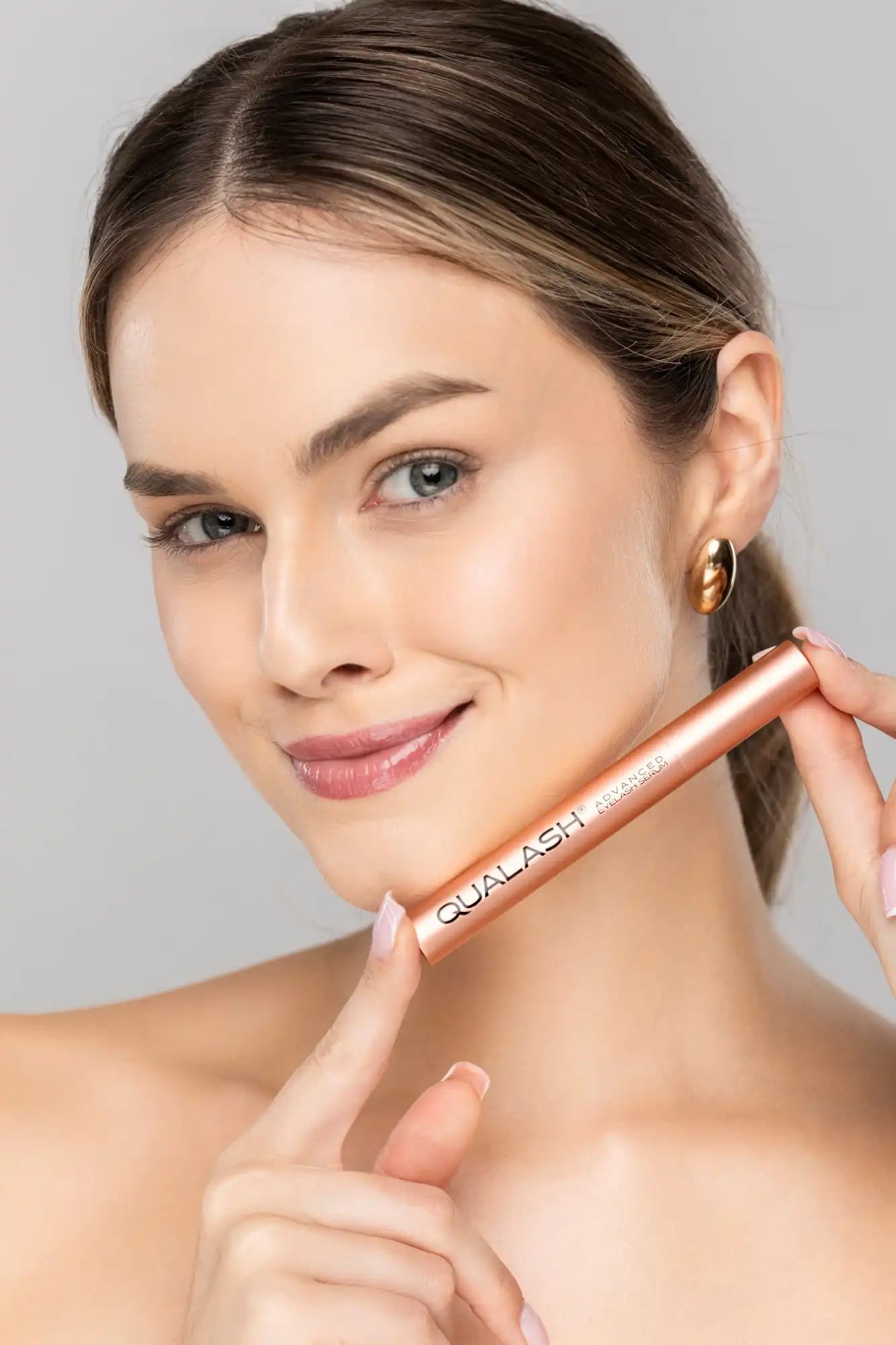 Rose gold mascara tube.