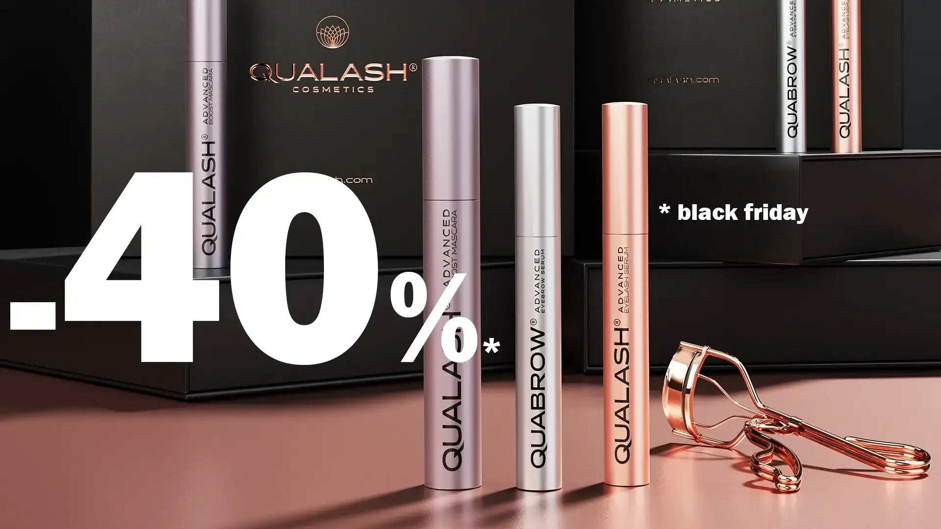 Silver and rose gold eyelash curler with black box packaging, qualash brand.